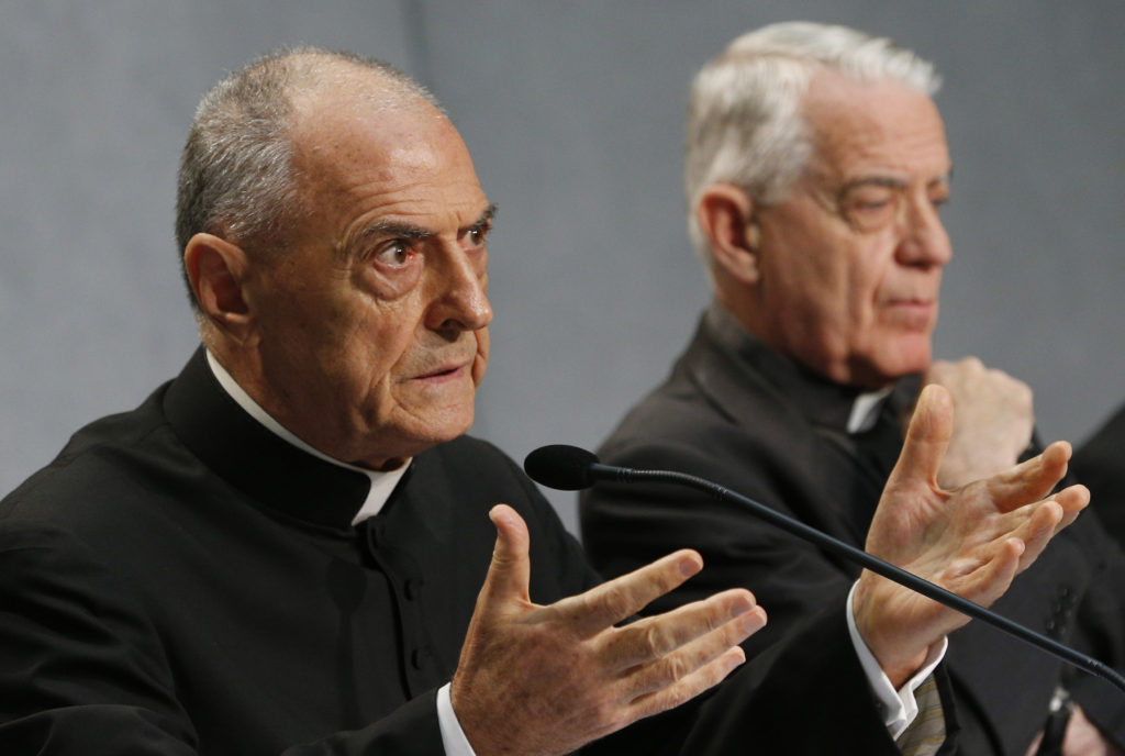 Msgr. Pio Vito Pinto, dean of the Roman Rota, a Vatican court, speaks at a press conference for the release of Pope Francis' documents concerning changes to marriage annulments at the Vatican Sept. 8. Also pictured is Jesuit Father Federico Lombardi, the Vatican spokesman. (CNS photo/Paul Haring)