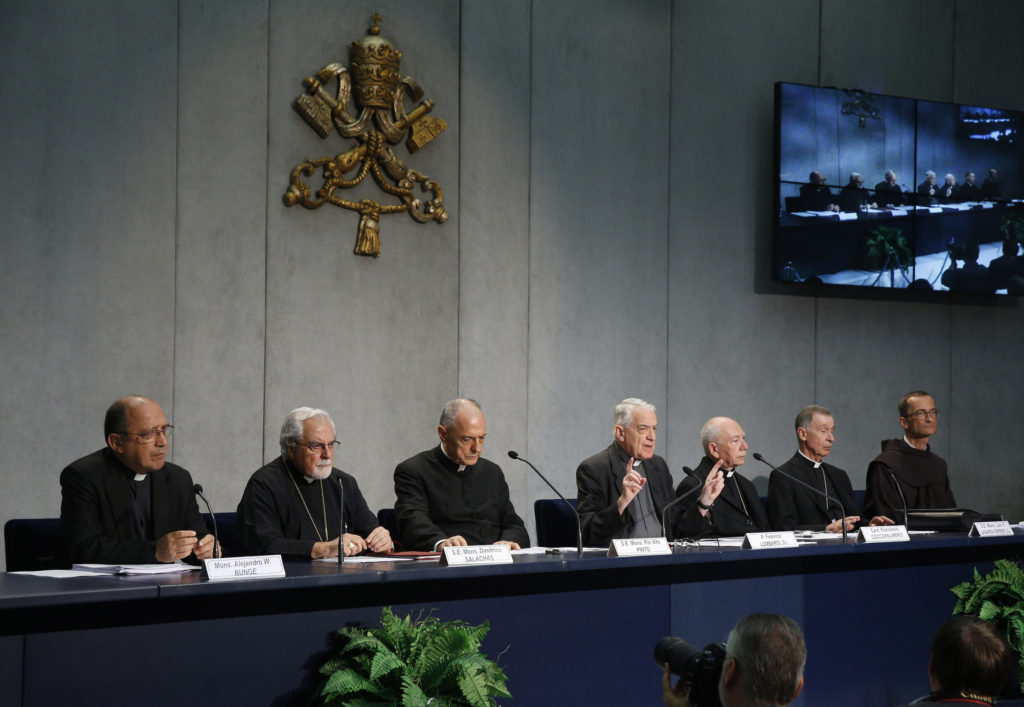 Father Federico Lombardi, the Vatican spokesman, gestures at a press conference for the release of Pope Francis' documents concerning changes to marriage annulments at the Vatican Sept. 8. Pope Francis approved rewriting sections of the Latin-rite Code of Canon Law and the Code of Canons of the Eastern Churches to make the annulment process quicker, less expensive and more pastoral. (CNS photo/Paul Haring)