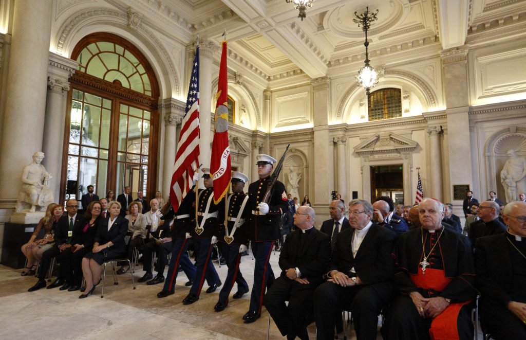 A Marine Corps color guard carries the U.S. and Marine flags during the inauguration of the new headquarters of the U.S. Embassy to the Holy See in Rome Sept. 9. (CNS photo/Paul Haring) 