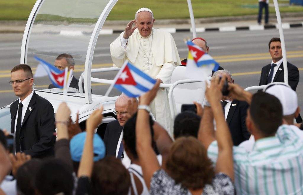 Pope Francis waves to the crowd as he arrives to celebrate Mass in Revolution Square in Havana Sept. 20. (CNS photo/Carlos Garcia Rawlins, Reuters)