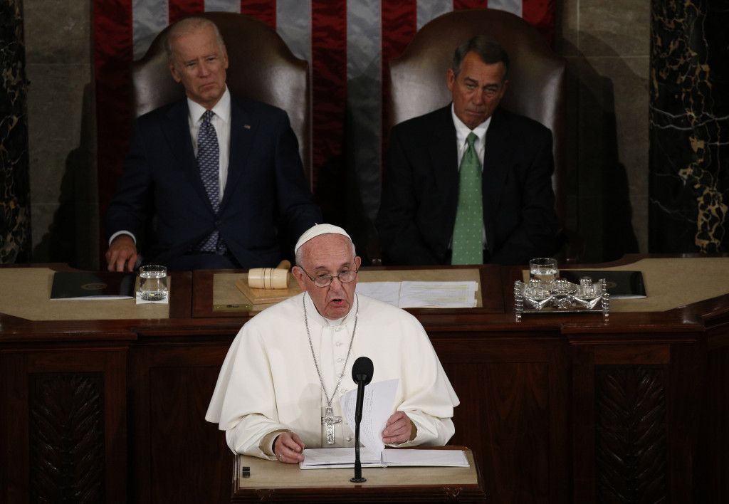 Pope Francis addresses a joint meeting of the U.S. Congress as Vice President Joe Biden (left) and Speaker of the House John Boehner look on in the House of Representatives Chamber at the U.S. Capitol in Washington Sept. 24. (CNS photo/Paul Haring)