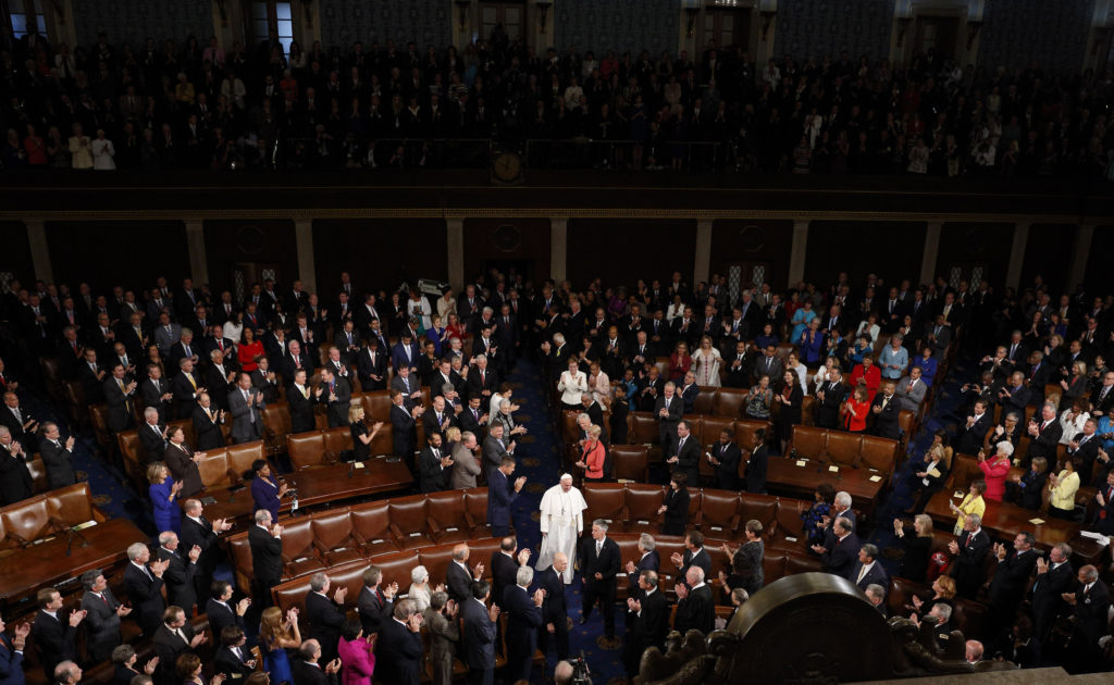 Pope Francis enters the House of Representatives Chamber to address a joint meeting of Congress at the U.S. Capitol in Washington Sept. 24. In the first such speech by a pope, he called on Congress to stop bickering as the world needs help. (CNS photo/Paul Haring)