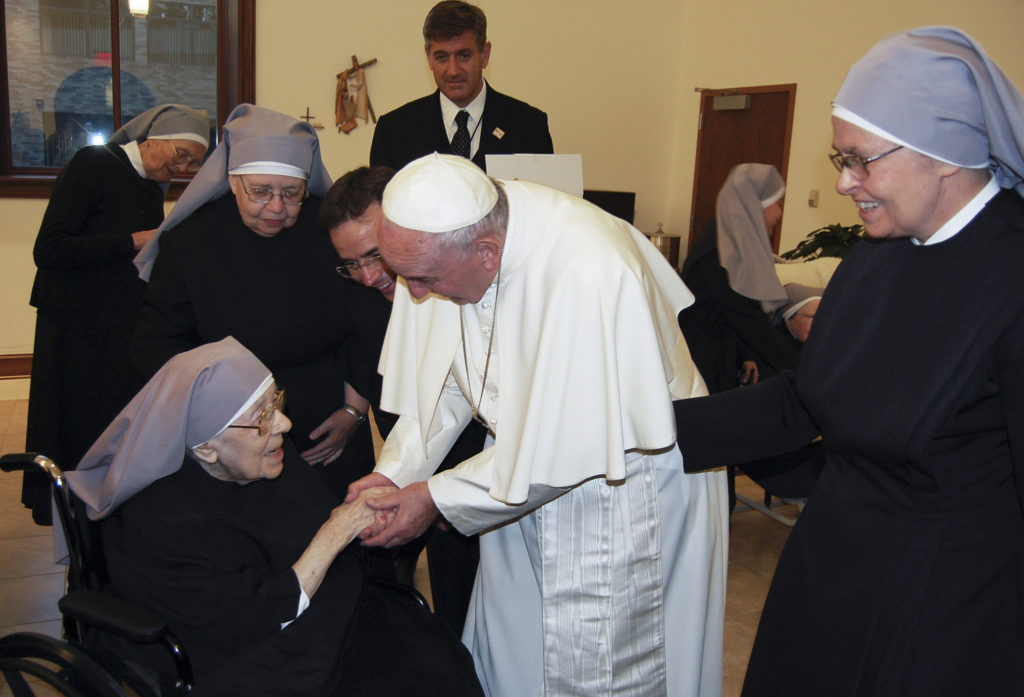 Pope Francis talks with Sr. Marie Mathilde, 102, during his unannounced visit to the Little Sisters of the Poor residence in Washington Sept. 23. (CNS photo/courtesy of the Little Sisters of the Poor)