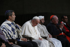 Pope Francis joins representatives of religious communities for meditations on peace in Foundation Hall at the ground zero 9/11 Memorial and Museum in New York Sept. 25. (CNS photo/Paul Haring)