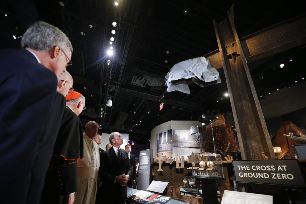 Pope Francis pauses in front of the ground zero cross at the National 9/11 Memorial and Museum in New York Sept. 25. (CNS photo/Paul Haring)