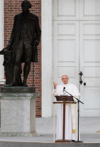 Pope Francis delivers an address from Independence Hall in Philadelphia Sept. 26. He spoke near a statue of George Washington to an estimated crowd of 50,000 people. (CNS photo/Lisa Johnston, St. Louis Review)
