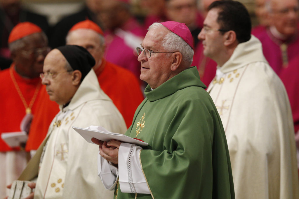 Archbishop Joseph E. Kurtz of Louisville, Ky., president of the U.S. Conference of Catholic Bishops, arrives for the opening Mass of the Synod of Bishops on the family celebrated by Pope Francis in St. Peter's Basilica at the Vatican Oct. 4. (CNS/Paul Haring) 