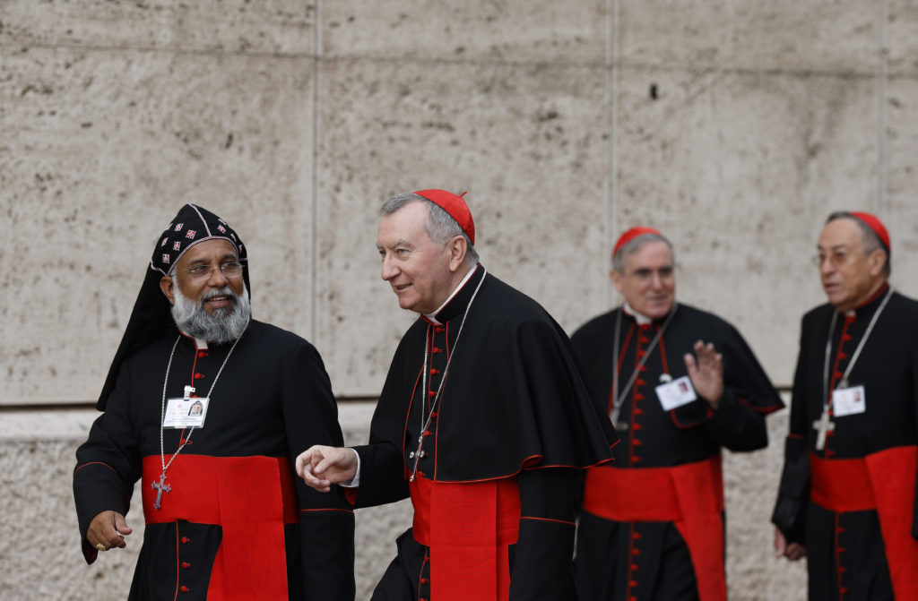 Cardinals talk as they arrive for the morning session of the Synod of Bishops on the family at the Vatican Oct. 6. From left are Cardinals Baselios Cleemis Thottunkal of Trivandrum, India, major archbishop of the Syro-Malankara Catholic Church; Pietro Parolin, Vatican secretary of state; Lluís Martínez Sistach of Barcelona, Spain; and Óscar Rodríguez Maradiaga of Tegucigalpa, Honduras. Cardinal Martínez Sistach, a canon lawyer, said the new annulment process isn't about shortcuts. (CNS photo/Paul Haring)