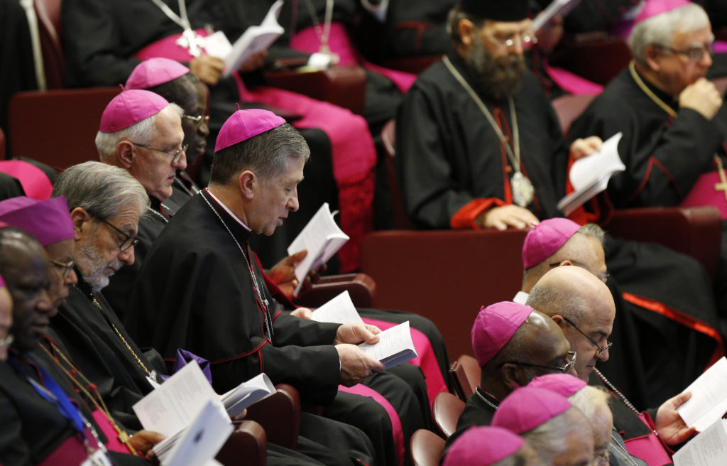 U.S. Archbishop Blase J. Cupich of Chicago participates in prayer at the start of a session of the Synod of Bishops on the family attended by Pope Francis at the Vatican Oct. 9. (CNS/Paul Haring) 