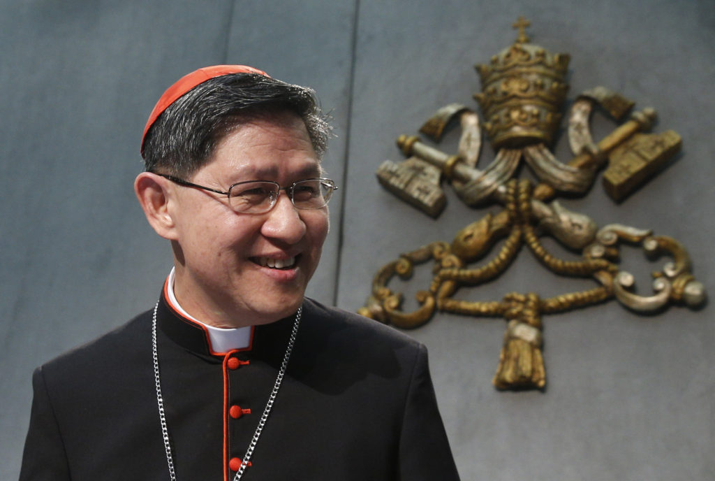 Cardinal Luis Antonio Tagle of Manila arrives for a media briefing after the morning session of the Synod of Bishops on the family at the Vatican Oct. 9. (CNS/Paul Haring) 