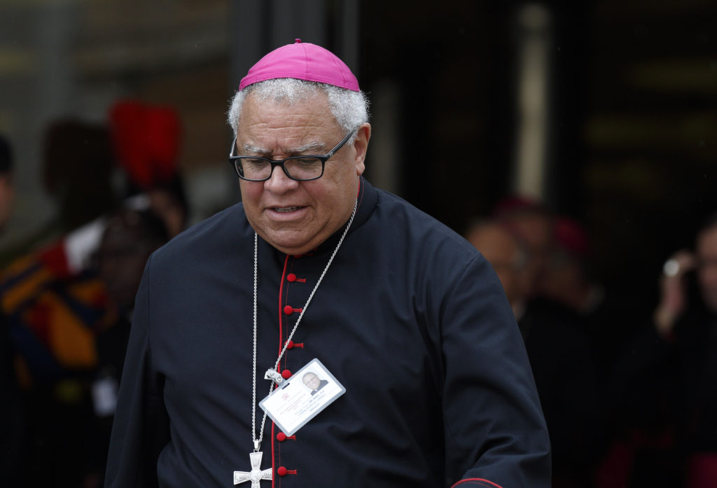 Bishop George V. Murry of Youngstown, Ohio, leaves a session of the Synod of Bishops on the family at the Vatican Oct. 14. (CNS photo/Paul Haring)