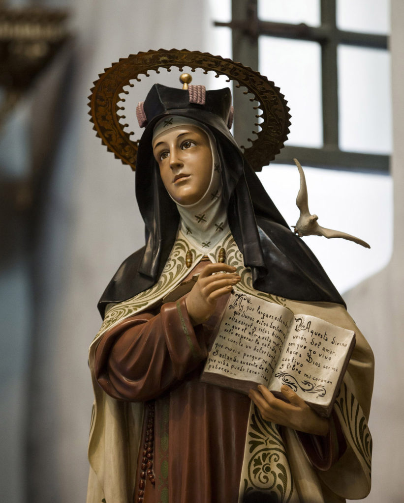 A statue of St. Teresa of Avila, Spanish mystic and doctor of the church, stands in the sanctuary of the Serra Chapel at Mission San Juan Capistrano in San Juan Capistrano, Calif. God's love is expansive, boundless and limitless, Pope Francis said while celebrating Mass on the feast of St. Teresa of Avila. (CNS photo/Nancy Wiechec) 