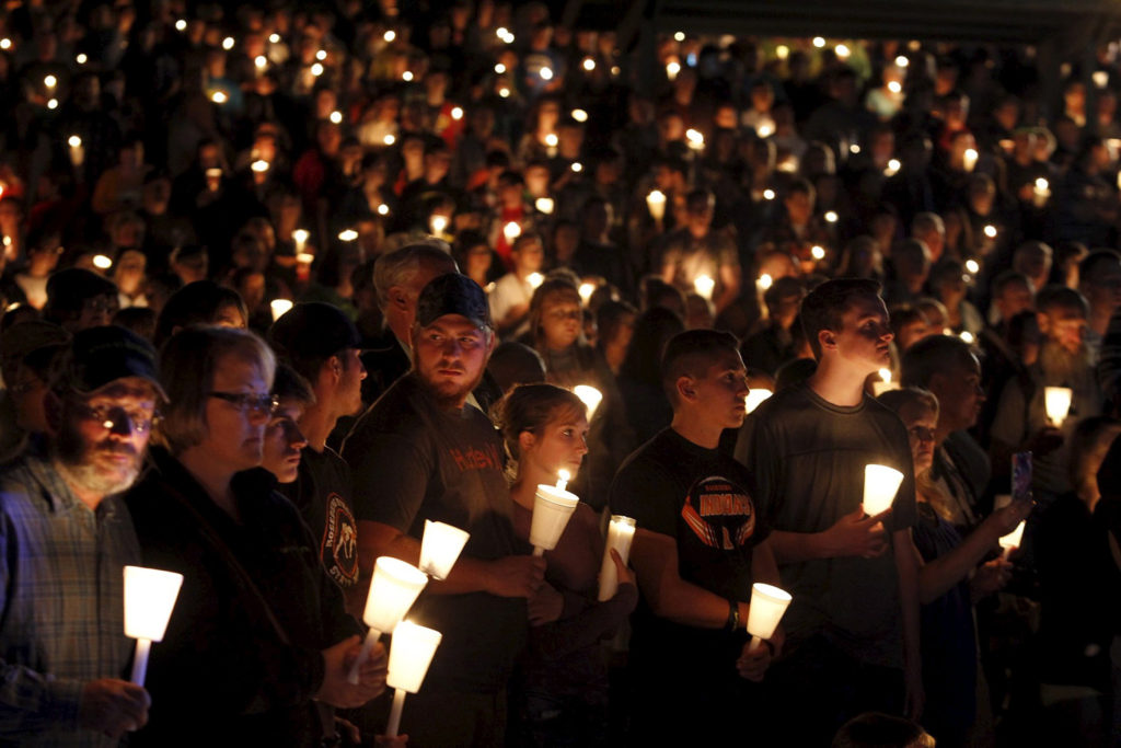 People take part in a candlelit vigil following a mass shooting at Umpqua Community College in Roseburg, Ore., Oct. 1. (CNS photo/Steve Dipaola, Reuters)