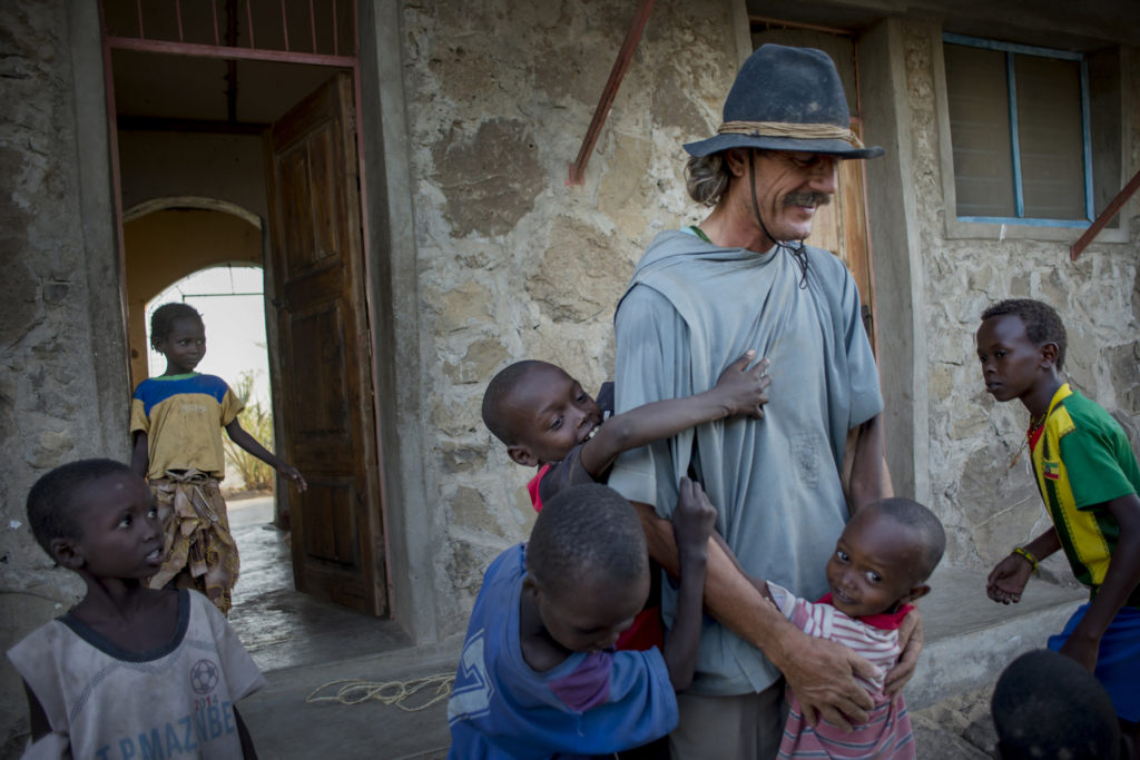 Benedictine Father Florian is greeted by children in early August after returning to Illeret, Kenya, from a trip to Nairobi. The Bavarian prince gave up his inheritance to become a Benedictine monk. (CNS/Christena Dowsett) 