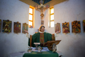 Benedictine Father Florian celebrates an afternoon Mass in early August in Illeret, Kenya. (CNS/Christena Dowsett) 