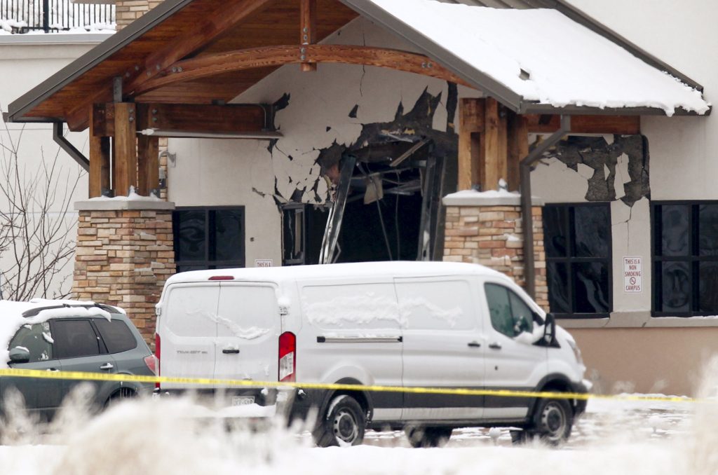 Damage is seen to the entrance of the Planned Parenthood clinic after a Nov. 27 shooting in Colorado Springs, Colo. Police say Robert Lewis Dear killed three people during the shooting rampage and hours-long standoff at the clinic and was later taken into custody. (CNS photo/Isaiah J. Downing, Reuters)