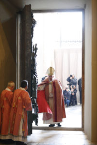 Pope Francis opens the Holy Door of the Basilica of St. John Lateran in Rome Dec. 13. Holy doors around the world were opened at city cathedrals, major churches and sanctuaries Dec. 13 as part of the Jubilee of Mercy. (CNS photo/Paul Haring) 