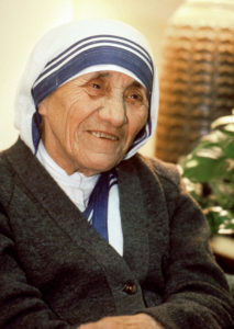 Pope Francis has approved a miracle attributed to the intercession of Blessed Teresa of Kolkata, paving the way for her canonization in 2016. Mother Teresa is seen during a visit to Phoenix, Ariz., in 1989. (CNS photo/Nancy Wiechec)