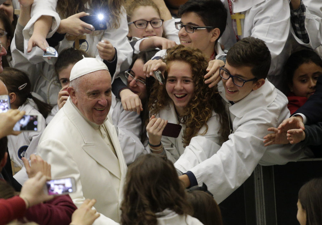 Pope Francis arrives to lead a special audience with the International Congress of Pueri Cantores in Paul VI hall at the Vatican Dec. 31. (CNS photo/Max Rossi, Reuters) 