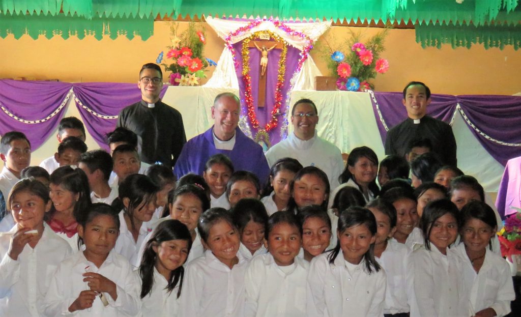 These children had some help from Vinhson Nguyen, a Phoenix seminarian, in preparing for their first reconciliation and communion.  (courtesy photo)