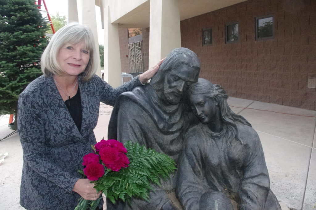 Patty Chesebrough stands near a statue at Holy Spirit Parish where Tears Speak, Spirits Soar was founded. (Joyce Coronel/CATHOLIC SUN) 