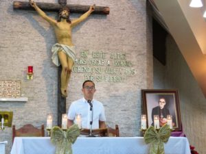 Vinhson Nguyen, a seminarian for the Diocese of Phoenix, reads from the pulpit (courtesy photo)