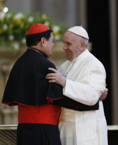 Pope Francis embraces Mexico City Cardinal Norberto Rivera Carrera during a meeting with Mexico's bishops in the cathedral in Mexico City Feb. 13. (CNS photo/Paul Haring)