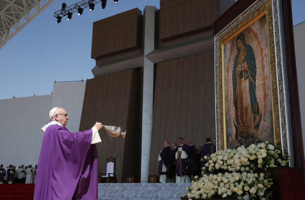 Pope Francis uses incense to venerate an image of Our Lady of Guadalupe during Mass in Ecatepec near Mexico City Feb. 14. (CNS photo/Paul Haring)