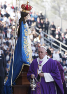 Pope Francis uses incense as he venerates a statue of Mary during Mass with priests and religious at a stadium in Morelia, Mexico, Feb. 16. (CNS photo/Paul Haring)
