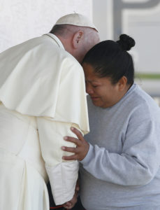 Pope Francis embraces a female prisoner as he visits Cereso prison in Ciudad Juarez, Mexico, Feb. 17. (CNS photo/Paul Haring) 