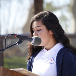 Citlally Ramirez, an eighth-grader at St. Vincent de Paul School in Maryvale, addresses her fellow Catholic Schools students from throughout the state at the Catholic Schools Week rally. (Ambria Hammel/CATHOLIC SUN)