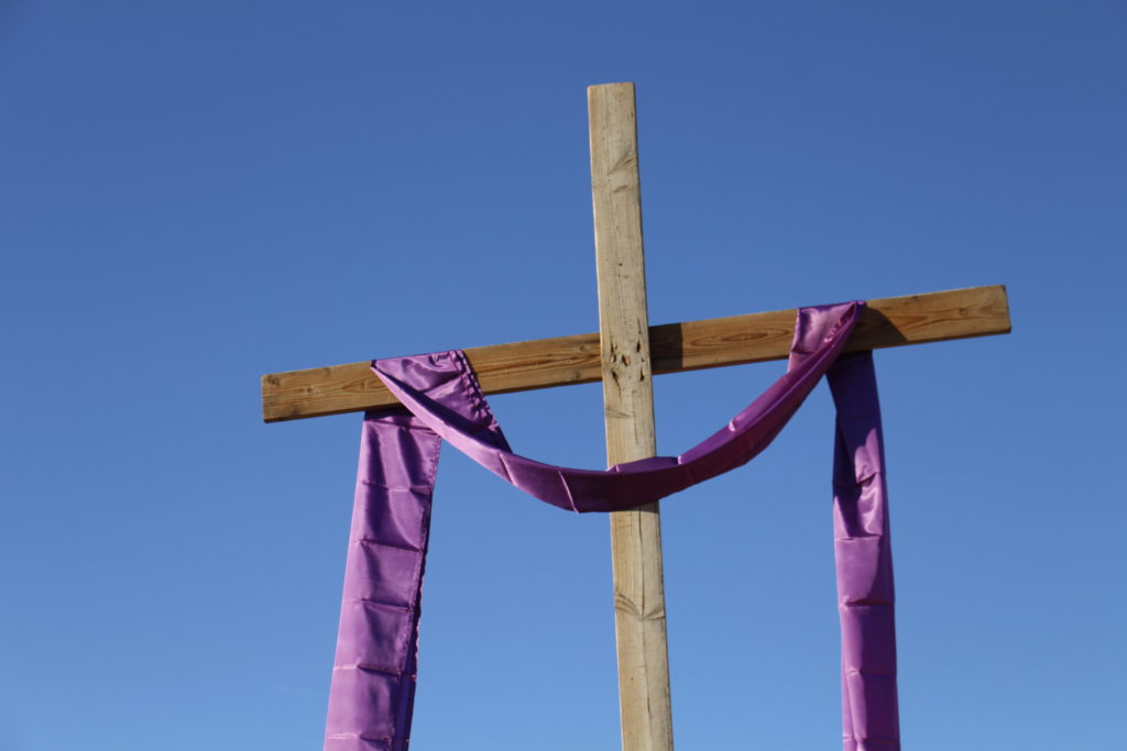 A purple cloth drapes a wooden cross outside of St. Louis the King Parish in Glendale Feb. 10, signaling the observance of the Lenten season . (Ambria Hammel/CATHOLIC SUN)