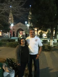 Rosa and Sergio Siller in a park in front of San Lorenzo Parish in Ciudad Juárez. The Sillers are pilgrims from Sacred Heart Parish in Phoenix. (Tony Gutiérrrez/CATHOLIC SUN)