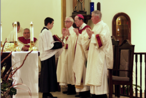 Bishop Thomas J. Olmsted and five priests concelebrated the 40th anniversary Mass for St. Elizabeth Seton Jan. 31. (Karen MAhoney/CATHOLIC SUN)