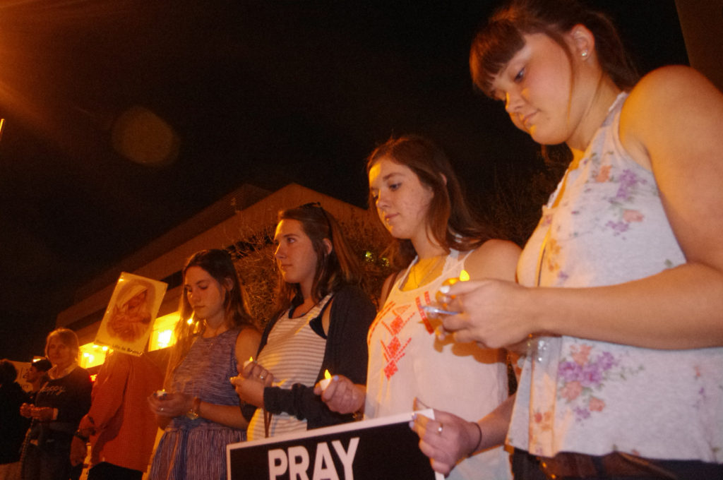 Forty Days for Life participants pray outside of Banner University Medical Center, where a baby was taken following an abortion procedure, Feb. 27 for the infant, the mother and local abortion workers. (Joyce Coronel/CATHOLIC SUN)