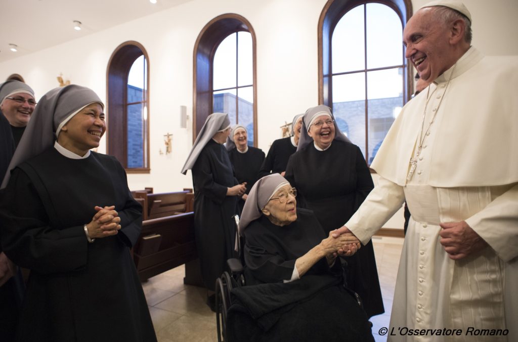 Pope Francis greets Sister Marie Mathilde, 102, during his unannounced visit to the Little Sisters of the Poor residence in Washington Sept. 23. (CNS photo/L'Osservatore Romano, handout) 