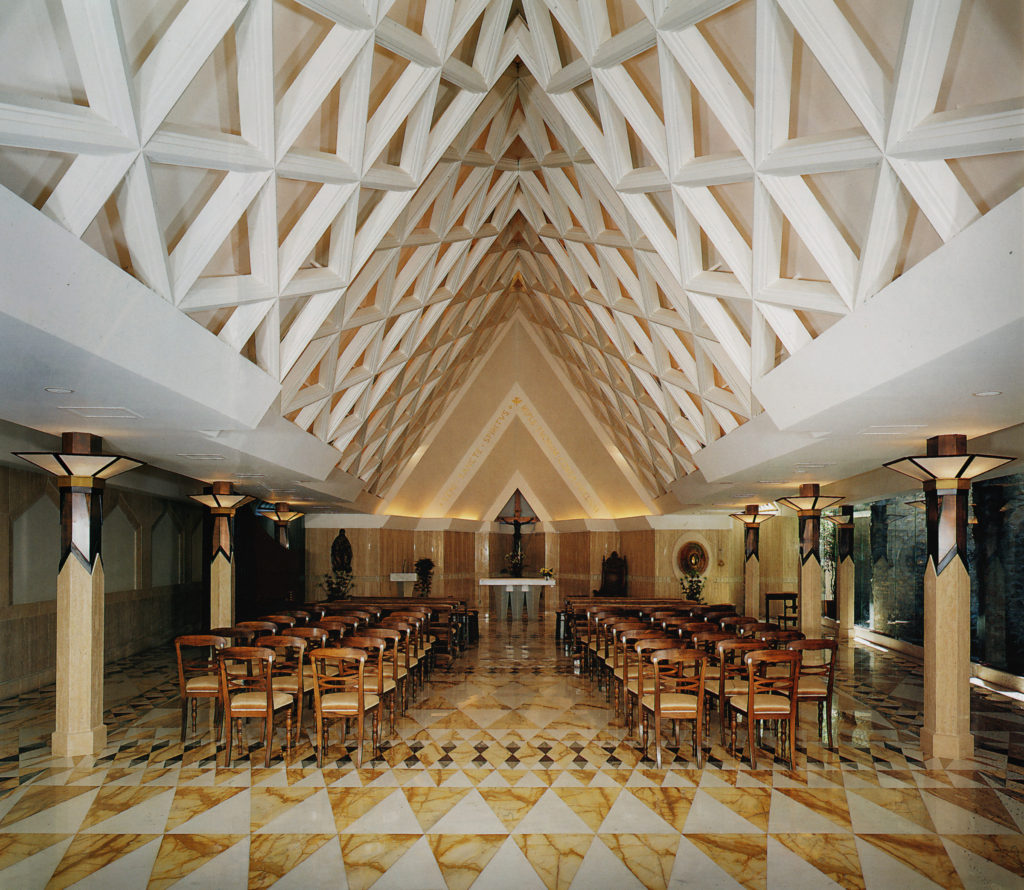 The interior of the Chapel of the Holy Spirit in Rome is seen in this undated photo. The chapel is the only building at the Vatican designed by an American. Pittsburgh architect Louis Astorino used triangles throughout the design to symbolize the Trinity. (CNS photo/courtesy of Astorino) 