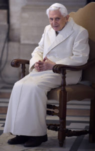 Retired Pope Benedict XVI attends the opening of the Holy Door of St. Peter's Basilica at the Vatican in this Dec. 8, 2015, file photo. In a written interview, the retired pope commented on the theme of mercy. "Mercy is what moves us toward God, while justice makes us tremble in his sight, Pope Benedict said. (CNS photo/Stefano Spaziani, pool) 