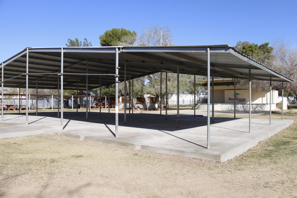 Parishioners recently pitched in to create cleaner ramada grounds at Blessed Sacrament in Tolleson. Massgoers during Holy Week now won't have to risk their chairs or shoes sinking into mud while in their Sunday best for outdoor services.  (Ambria Hammel/CATHOLIC SUN)