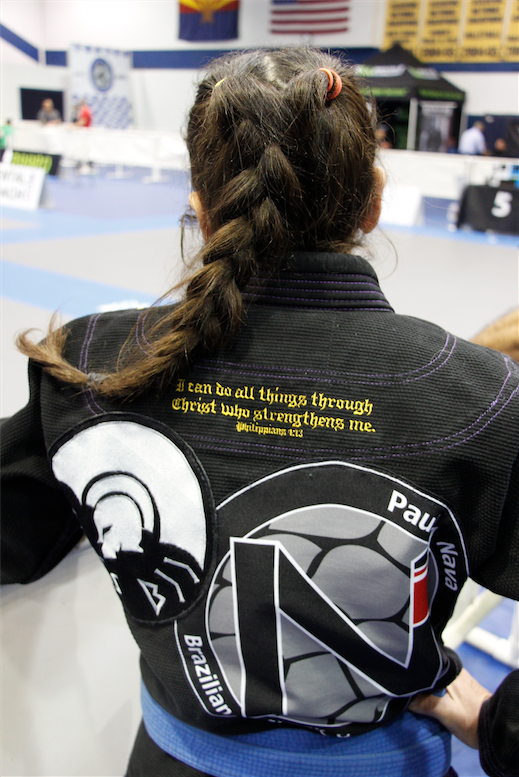 Melissa Veselovsky and her team is sponsored by DeuS Fight Company, which _____. (Ambria Hammel/CATHOLIC SUN)