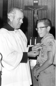 Rev. Eugene Maguire is seen presenting the Ad Altare Dei award to Boy Scout John Jakubczyk on Sept. 13, 1967. (Photo courtesy of diocesan archives)