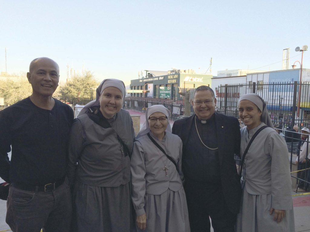 Bishop Eduardo A. Nevares, Phoenix auxiliary bishop, (second from left) bumped into pilgrims from Most Holy Trinity Parish outside the Catedral de Nuestra Señora de Guadalupe (Our Lady of Guadalupe Cathedral) in Ciudad Juárez, including (from left to right) Dcn. John Raphael Dalisay, DS, Sr. Maria Caritas Wendt, SOLT, Sr. Maria de Jesucristo Crucificado Rodriguez, SOLT, and Sr. Mary Joy Bernklau, SOLT. (Photo courtesy of Sr. Caritas Wendt, SOLT)