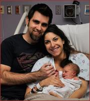 Marc and Amanda Missildine, who is alive today because of blood donors, poses with her Marc, after the birth of their first child last year. (courtesy photo)