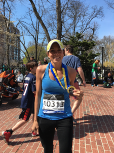 Bry Lauck poses with her medal after finishing the Boston Marathon April 18. (courtesy photo)