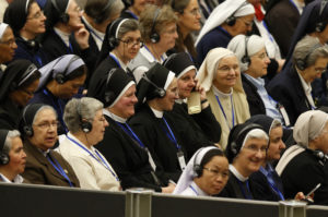 The heads of women's religious orders attend an audience with Pope Francis in Paul VI hall at the Vatican May 12. During a question-and-answer session with members of the International Union of Superiors General, the pope indicated his willingness to establish a commission to study whether women could serve as deacons. (CNS photo/Paul Haring)