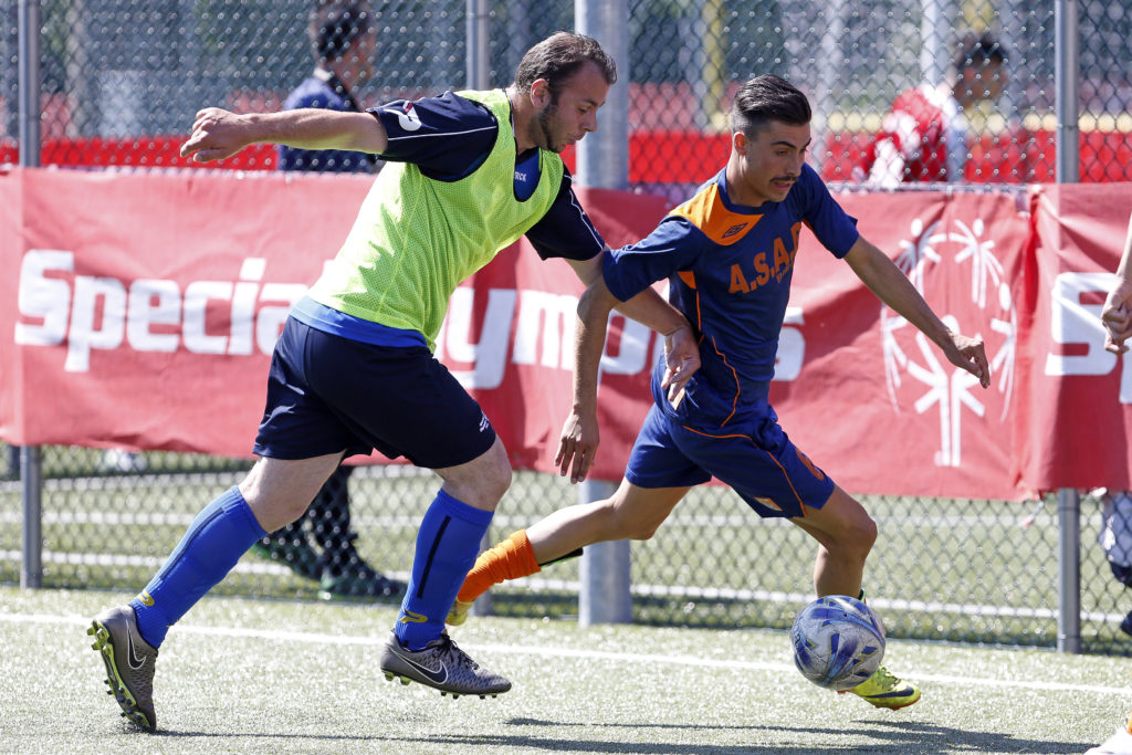 Soccer players from ASAD Biella and France compete in the Special Olympics international soccer tournament sponsored by the Knights of Columbus in Rome May 21. Four teams from Italy took on teams from France, Hungary, Lithuania and Poland. The tournament brought together players with and without intellectual disabilities as a model for how communities can include those with disabilities. (CNS photo/Giampiero Sposito) See SPECIAL-OLYMPICS-SOCCER May 23, 2016.