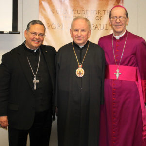 Bishop Dino (center) poses with Phoenix Bishop Thomas J. Olmsted (right) and Auxiliary Bishop Eduardo A. Nevares (left) during the Diocese of Phoenix's clergy day Jan. 27.