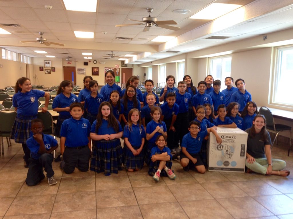 Third-graders at St. Louis the King pooled their money to buy a brand new car seat for a newborn who will call The Michael House home. It's one of four community homes run in the Valley by Maggie's Place. (courtesy photo)