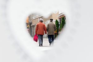 In this 2013 file photo, a couple walks down a street in Hanover, Germany. (CNS photo/Julian Stratenschulte, EPA)