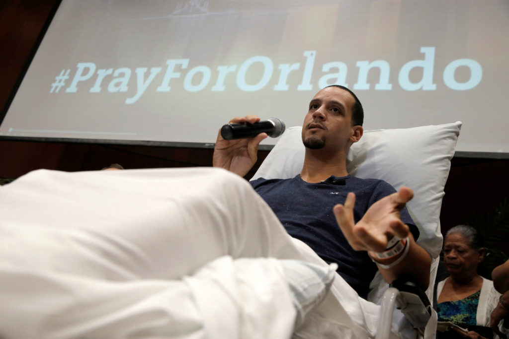 Angel Santiago, one of the survivors of the mass shooting at Pulse nightclub in Orlando, Fla., recounts his story at a June 14 news conference at Florida Hospital Orlando. A lone gunman, pledging allegiance to the Islamic State terrorist group, killed 49 people and injured more than 50 others early June 12 at the nightclub. (CNS photo/Jim Young, Reuters) 